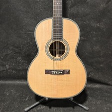 natural wood color acoustic guitar