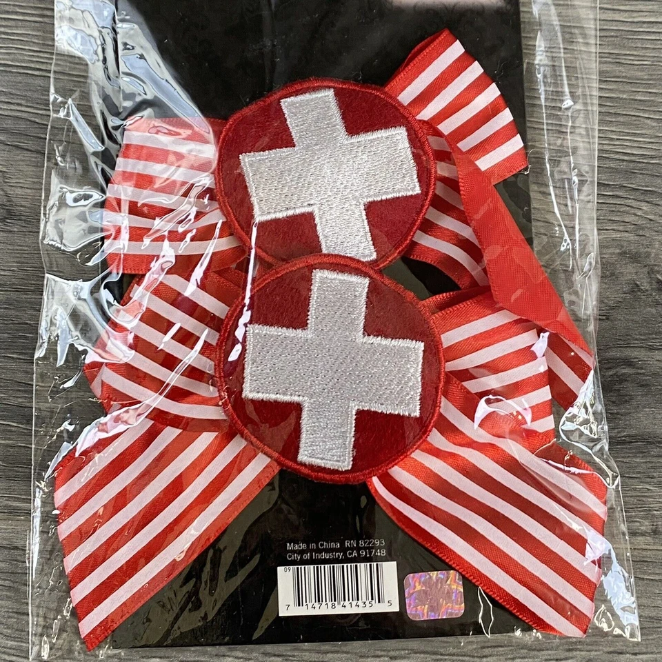 Pinzas de moño de enfermera Leg Avenue rojo blanco caramelo rayas disfraz cruzado Foto 3 de 4