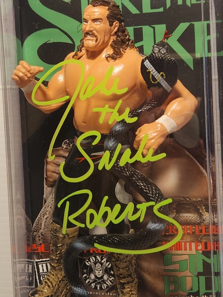 Figura de acción Sinn Bodhi autografiada por Jake Snake Roberts todavía en paquete sin abrir Foto 2 de 4
