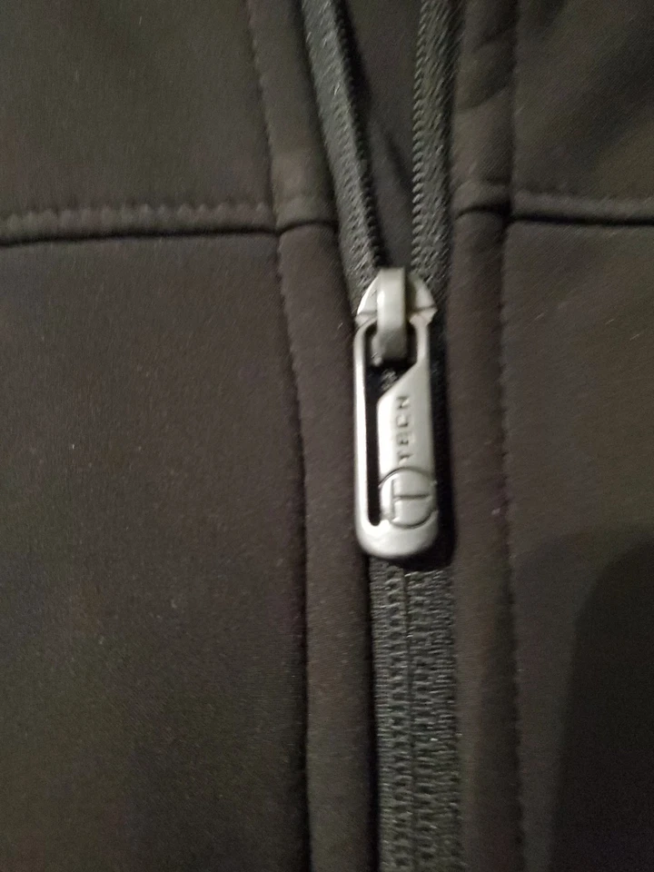 Chaqueta Tumi Forrada de Vellón Cremallera Completa Negra Hombres XL Abrigo de Invierno Negro Bolsillos Viaje  Foto 3 de 4