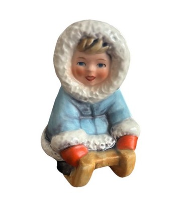 Goebel W. Germany Porcelain Figurine   Arctic Child on Sled, Hand-Painted