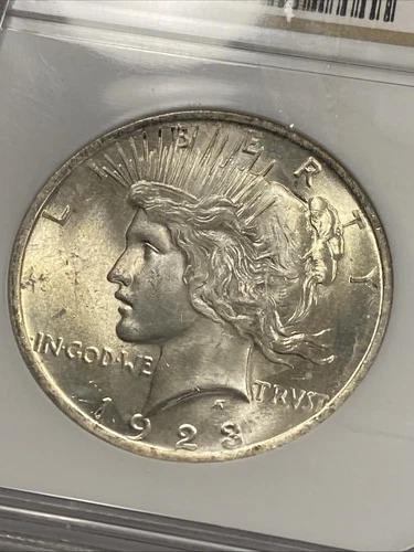 1923 $1 Silver Peace Dollar NGC MS64 Item 8699