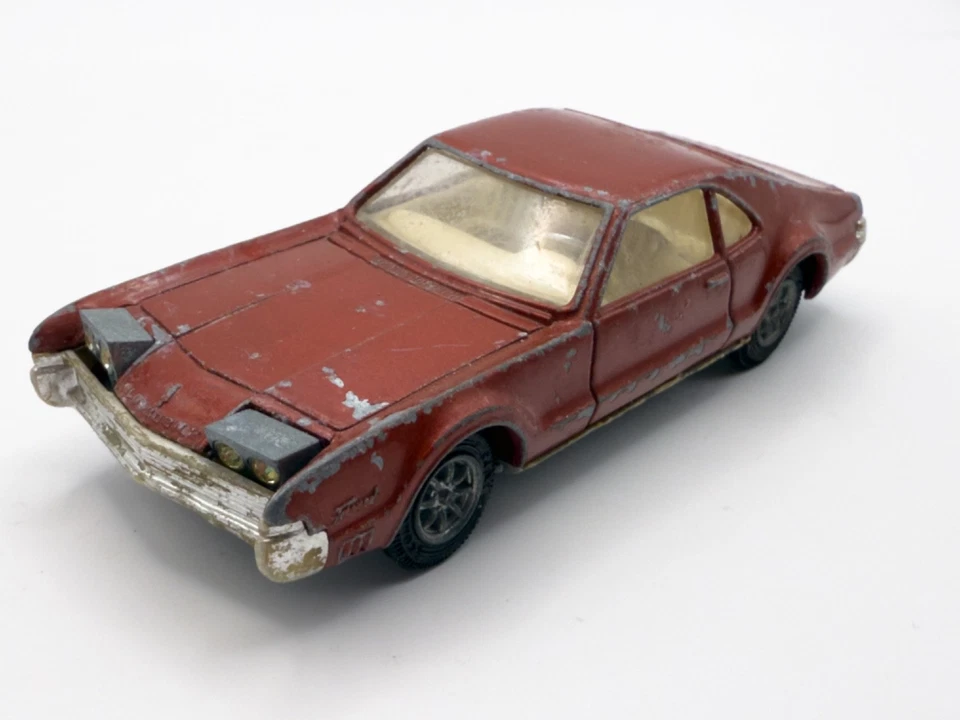 COCHE VINTAGE CORGI TOYS 276 OLDSMOBILE TORONADO MARRÓN METÁLICO GATOS DORADOS 1968 Foto 2 de 4