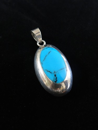 Sterling Silver and Turquoise South Western Pendant