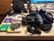 Nikon D70s DSLR Camera, Nikon 18-70mm and 70-300mm zoom lenses, and accessories