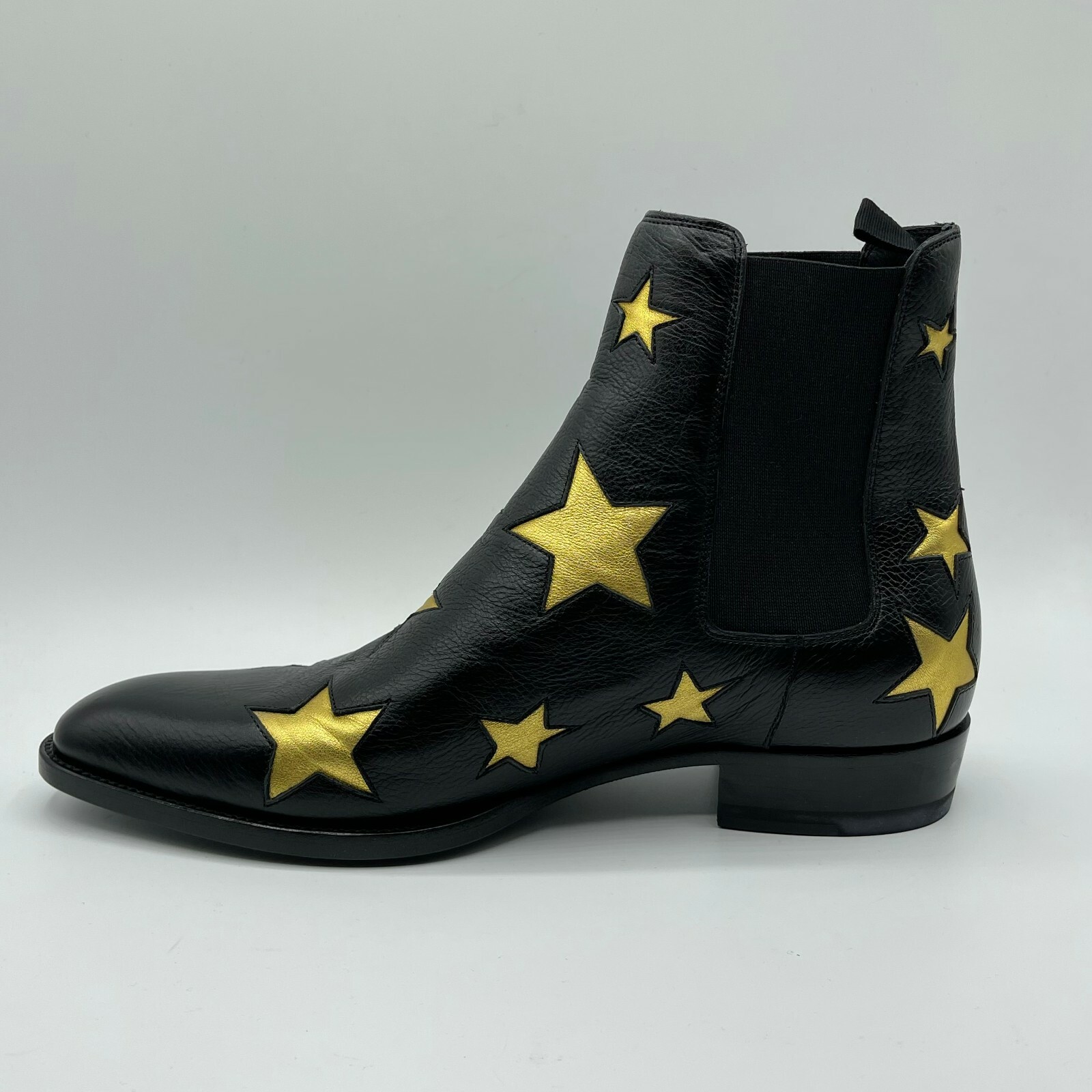Stivaletti Saint Laurent Wyatt uomo in pelle nera oro stella cerniera 579404 1087