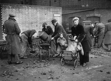 Men women collecting their coke coal rations in sacks from South M- Old Photo