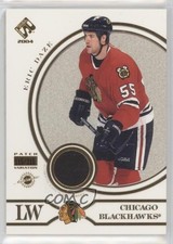 2003-04 Pacific Private Stock Reserve Patch 115/310 Eric Daze #152 Patch 0m2