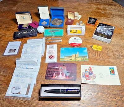 Lot of CUNA Mutual Group Souvenirs Medallions Knives Key Chains Post Cards
