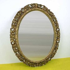 cornice con specchio in legno e gesso ovale