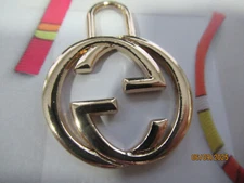 GUCCI   ZIPPER PULL CHARM 27X34MM  GOLD tone metal ,