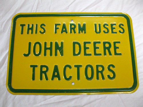 This Farm Uses John Deere Tractors Metal Sign 18" x 12"