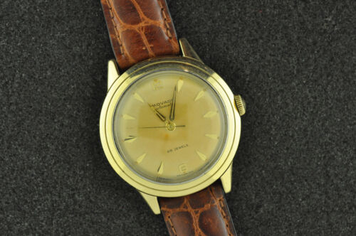 NICE VINTAGE 28 JEWEL MOVADO STEEL AND 14K SOLID GOLD AUTOMATIC CALIBER 431 - Picture 1 of 4