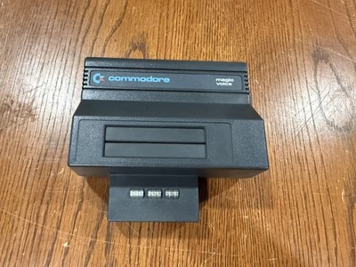 Commodore 64 - Magic Voice Cartridge w/ Cartridges and Manual