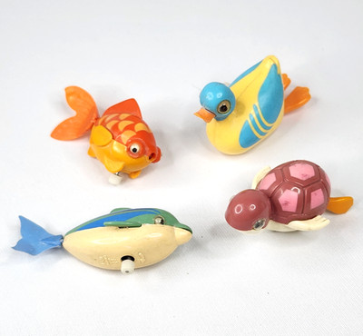 Tomy Vtg Tubbies Wind Up Swimming Toys x4 Turtle Dolphin Duck Fish Google Eyes