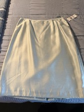 Mint green Two piece le suit jacket and skirt set Women's size 18. never worn
