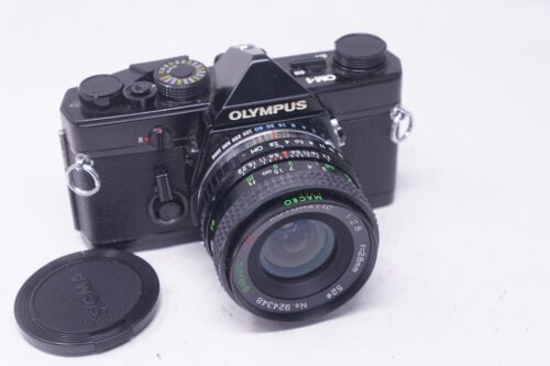 Olympus OM1 N 35 mm Spiegelreflexkamera mit Sirius 28 mm Prime Objektiv (schwarz) - Bild 1 von 8