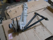 Polaris 325 Trail Boss 2000 00 right front spindle a arm hub shock strut mount