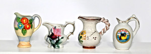 4 Miniture Collectible Pitchers. #110