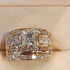 LADYS 14K YELLOW GOLD WEDDING SET.