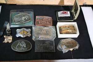 Vintage Caterpillar  Belt buckles and Assorted Belt Buckles.