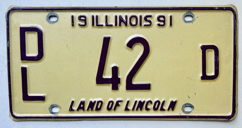 Illinois 1991 Dealer License Plate DL 42 D Low Number Tan Purple Magenta