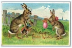 1909 Easter Wishes Anthropomorphic Bunny Rabbit Holding Eggs Embossed Postcard