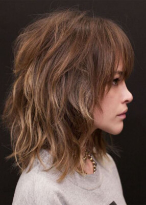 Image of Wavy shaggy bob shoulder length shaggy layered hairstyle