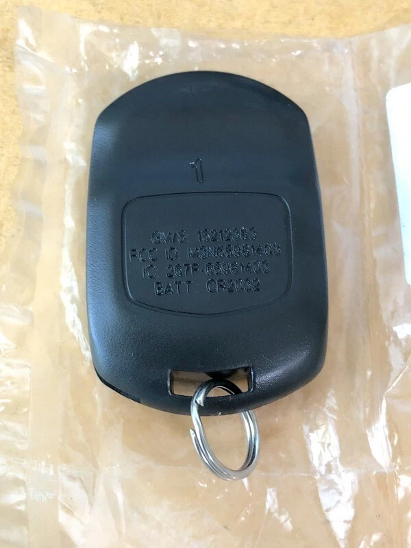 NEW OEM 05-07 CADILLAC STS KEYLESS REMOTE FOB TRANSMITTER 