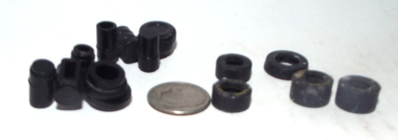 Lot of 5 Very Small Misc. Rubber Tires and 2 Plastic Piles of barrels & tires