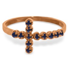 18K. SOLID GOLD CROSS RING WITH NATURAL SAPPH...