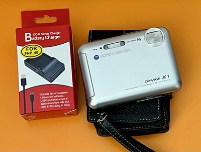 Konica Minolta DiMAGE X1 Digital Camera + Charger + Hugo Boss Leather Case