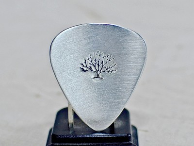 Guitar pick in sterling silver with big tree