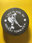 OLD VINTAGE HOCKEY PUCK - LAKE PLACID NY HOCKEY TOWN USA — photo 1