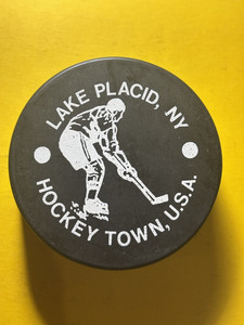 OLD VINTAGE HOCKEY PUCK - LAKE PLACID NY HOCKEY TOWN USA