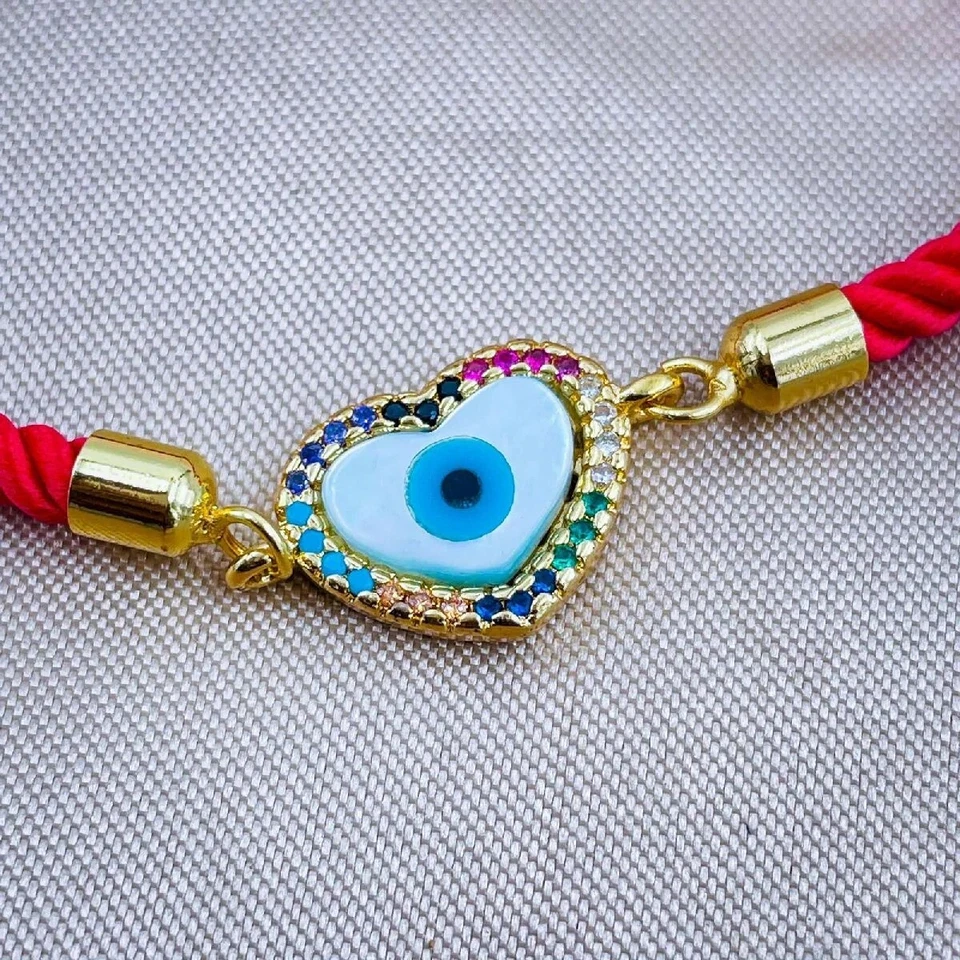 Pulsera de hilo multicolor madreperla mal de ojo Foto 3 de 3