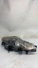 Used Right Headlight Assembly fits: 2012 Nissan Murano 2 Dr Conv halogen R. Righ