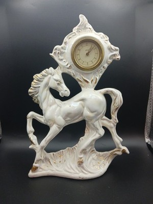 Italian Painted Rearing Horse With Gold Accents Fitted With A West German Clock