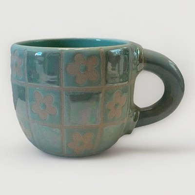 Charming handmade studio pottery mug featuring a whimsical, retro-inspired