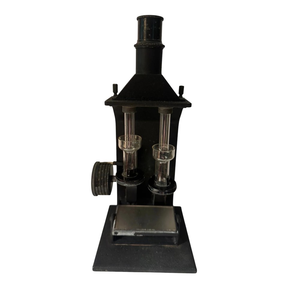 An early 20th-century Bausch & Lomb colorimeter — a brass-and-glass optical scientific instrument that looks like it belongs in a mad scientist's lab.