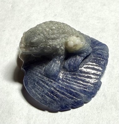Frog On Lotus Leaf Carving In Blue Sapphire 127.1 Cts