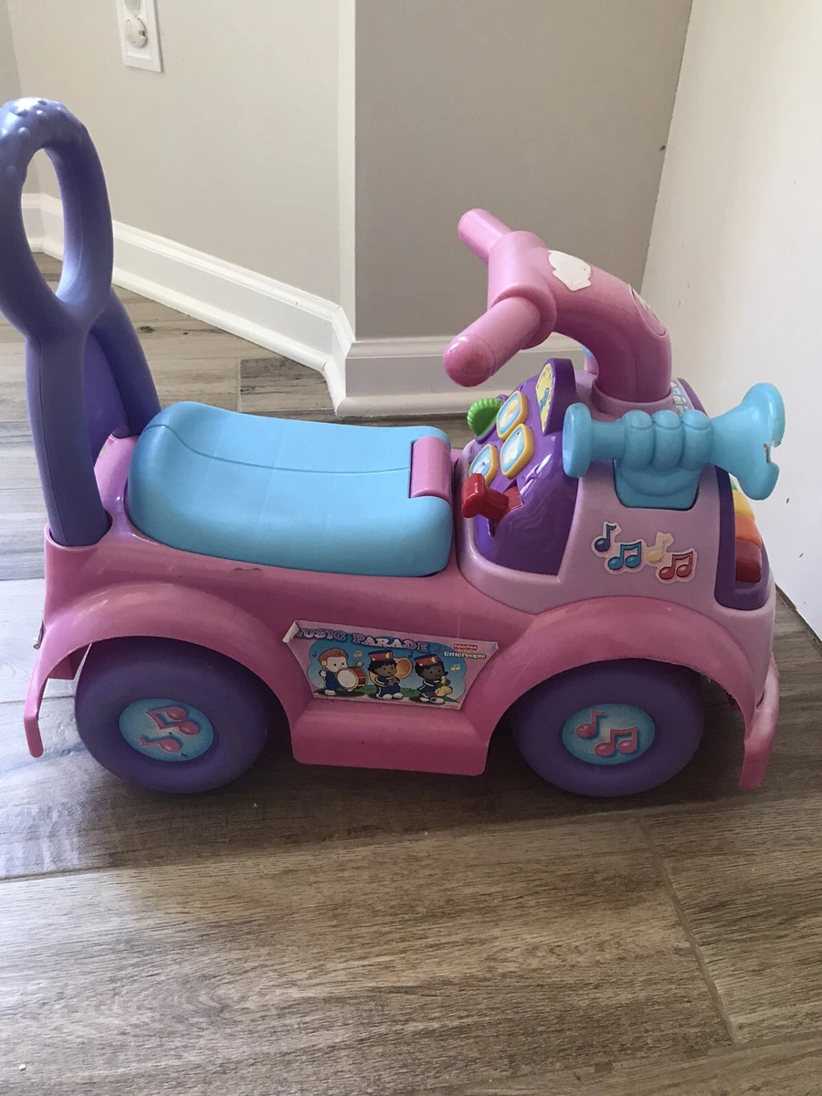 Fisher price music parade ride on pink online