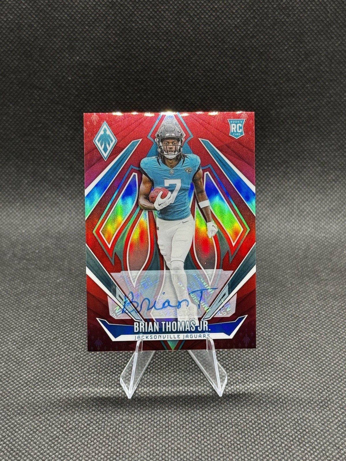 2024 Panini Phoenix - Rookies Brian Thomas Jr. #164 Red /99 (RC)