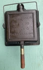 The Wagner Mfg. Co. SQUARE FLIPPING CAST IRON WAFFLE MAKER 3pc Pat’d Feb 22 1910