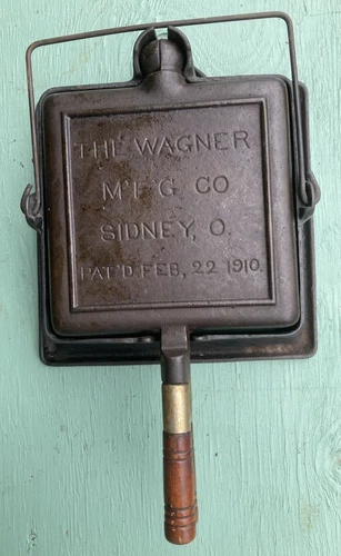 The Wagner Mfg. Co. SQUARE FLIPPING CAST IRON WAFFLE MAKER 3pc Pat’d Feb 22 1910