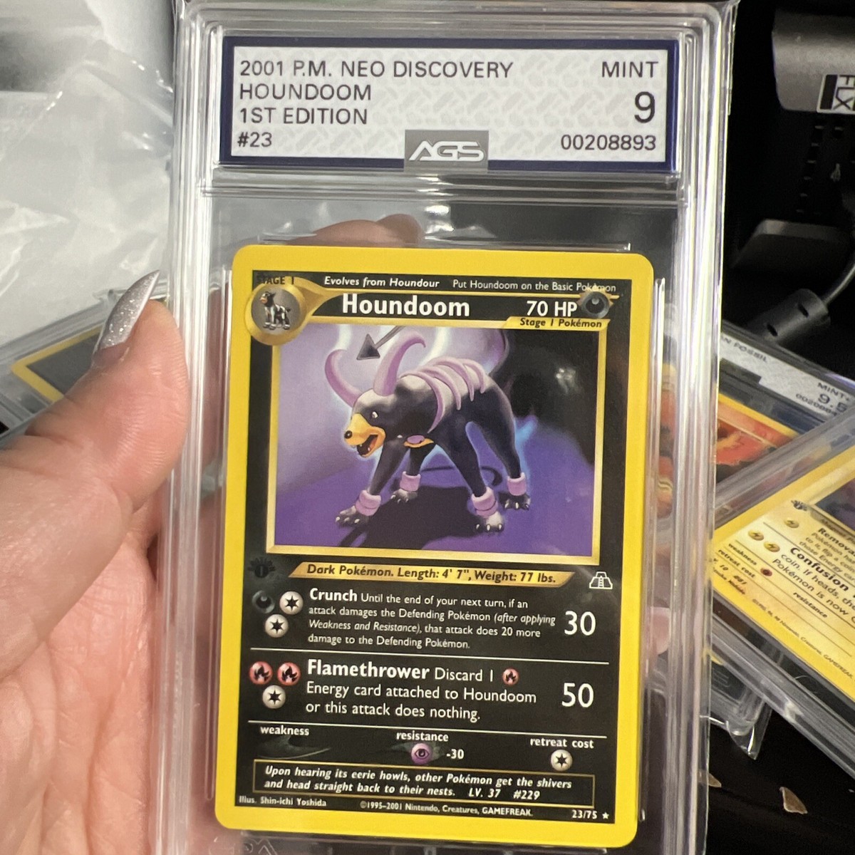2001 POKEMON NEO DISCOVERY #23 HOUNDOOM 1ST EDITION Graded AGS 9