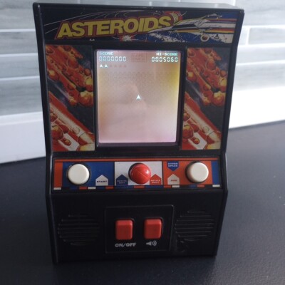 VINTAGE ATARI Interactive Asteroids Mini Arcade Handheld Game WORKS GREAT!