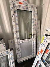 Brand new UPVC back door with clear glass and laminate panel. 830mm x 2045mm
