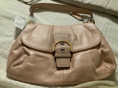 A brand new coach leather shoulder bag   brand new tags attached. -348 MRP