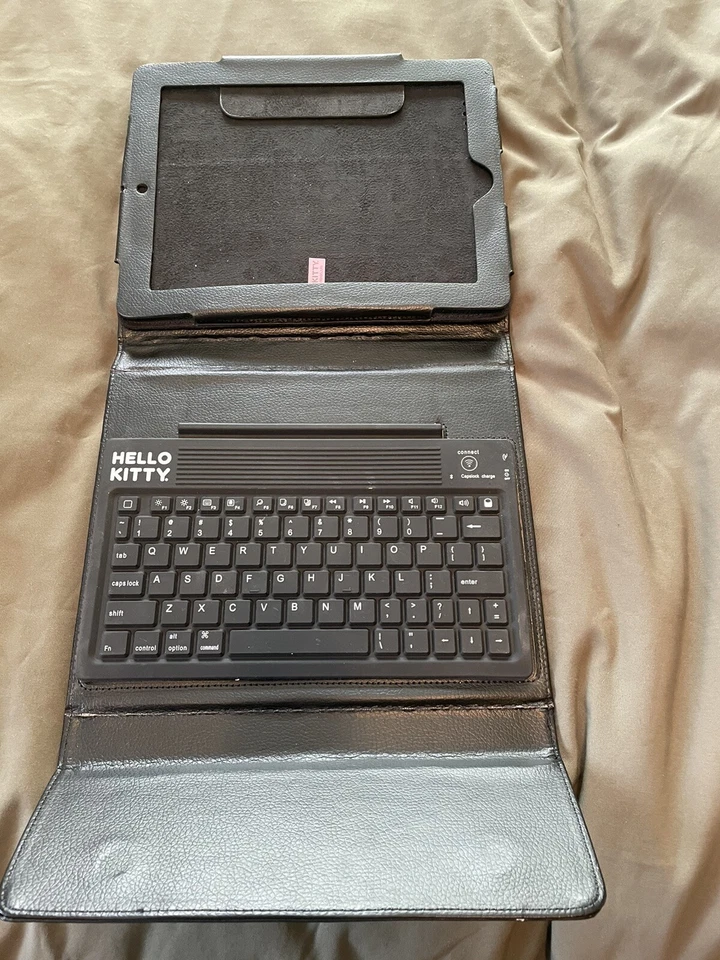 Funda portafolio de cuero Hello Kitty para iPad 2/3 con teclado inalámbrico, soporte para lápices Foto 3 de 4